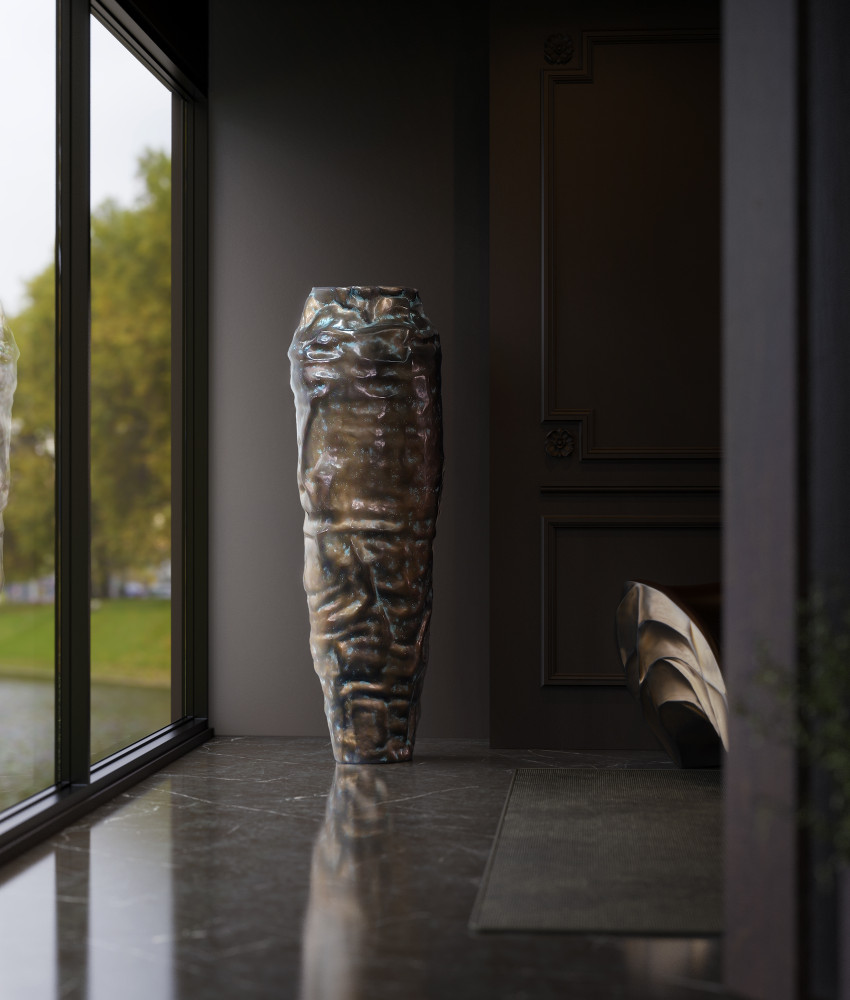 Argus vase bronze color next to window
