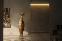 Brutus sculptural tall vase w/ custom brass finish. Textured surface and narrow neck. Modern statement piece.