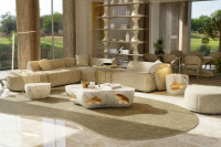 Oasis set of tables with marbled finish and gold leaf on a living room