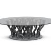 Allana coffee table with glass top and aged concrete color base